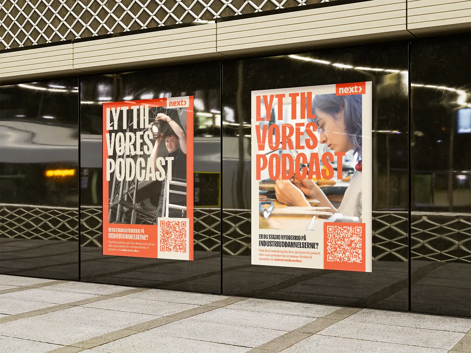 Promotional posters for NEXT's podcast, hanging in an underground station
